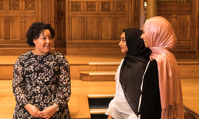 Letitia Budu talks with MAP students in the Whitworth Hall.