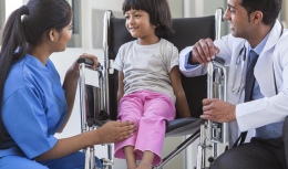 Child with medical staff