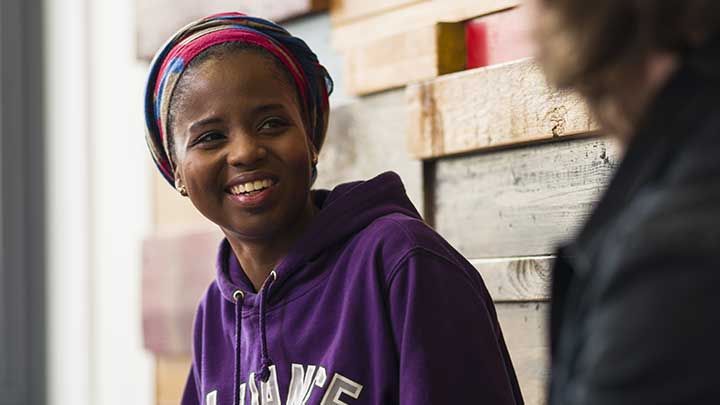 Female student talking and smiling