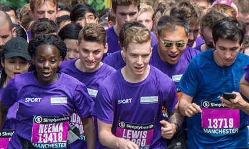 University staff running at the Great Manchester Run