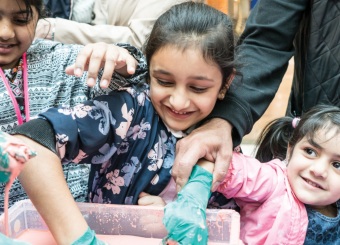 Children enjoying the ScienceX activities