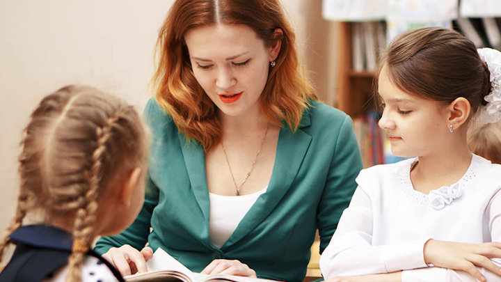 Two students using a computer